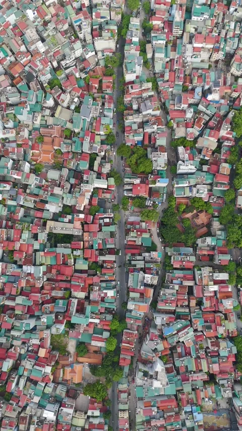 Vertical top-down aerial drone view of Hanoi, Vietnam, showcasing a dense Stock Footage 315696652