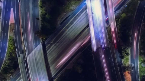 Vertical top down aerial timelapse view of traffic on freeway interchange Stock Footage 72685974