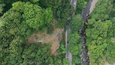 Vertical top down drone flight over mountain road in Rhodopes Bulgaria 스톡 동영상 345096184