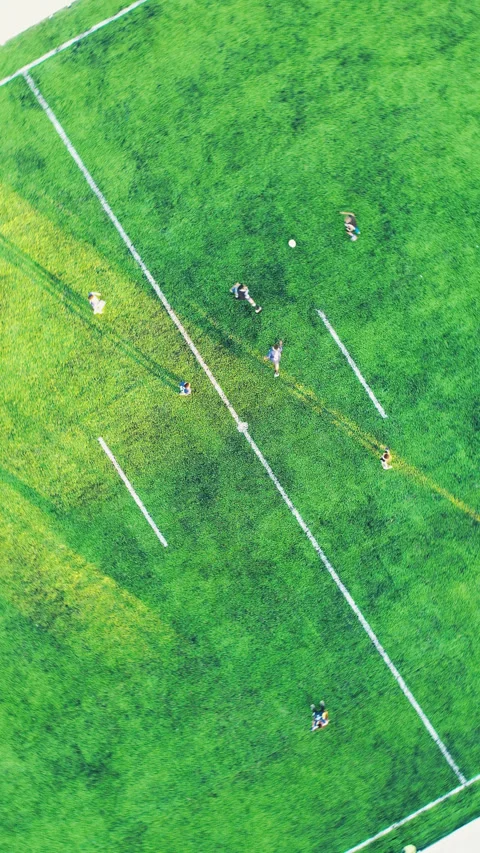 Vertical Top-down drone view of soccer kickoff with players on field aerial 4k Stock Footage 315883710
