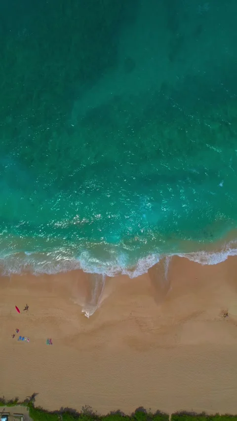 Vertical Top-Down View of Turquoise Ocean Waves on Beach Stock Footage 337927001