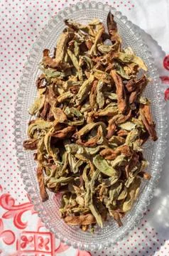 Vertical top shoot of dried string beans on tranparent plate Stock Photos
