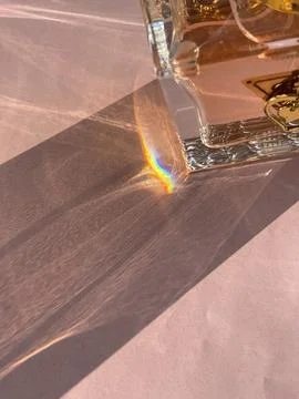 Vertical top view close up of small rainbow and artistic shdows of sun shinin Stock Photos