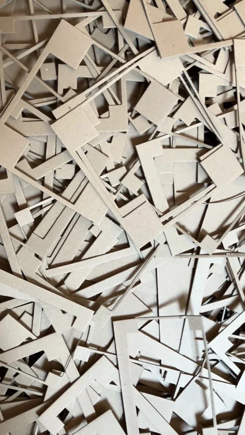 Vertical top view pile of shredded brown cardboard and paper scraps. Stock Footage 345646986