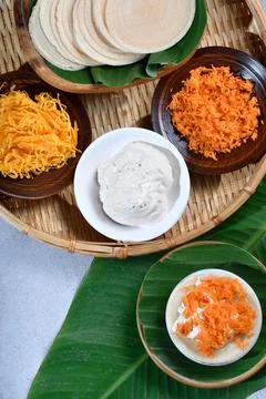 Vertical top view of Thai crispy pancakes topped with strips of egg yolks s.. Stock Photos