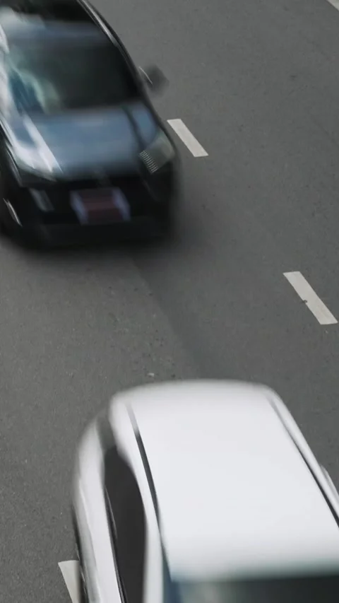 Vertical top view time lapse of busy asphalt road with heavy traffic during rush Stock Footage 295834509