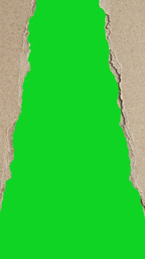 Vertical torn cardboard texture split center up revealing animated on green Stock Footage 335216706