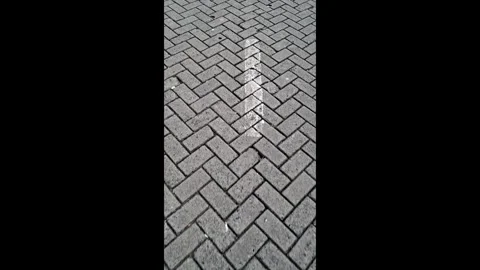 Vertical Tracking Shot of Concrete Paving Block Pattern Stock-Footage 336436305