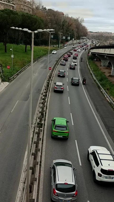 Vertical traffic shot at the rush hour on a city road of Rome. Stock Footage 302385774