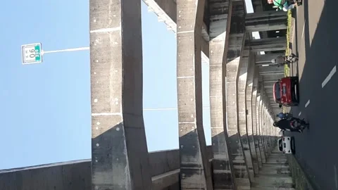 Vertical : Traffic Under the concrete flyover Stock Footage 195926630