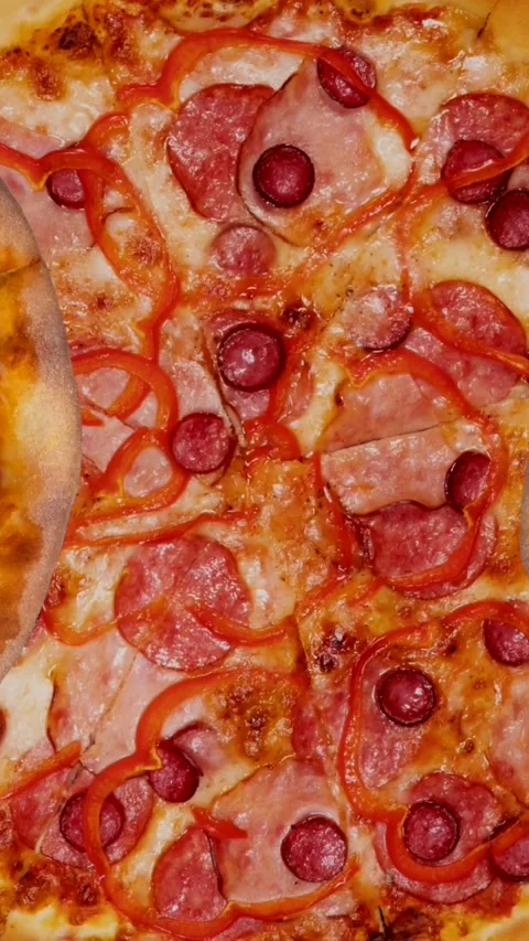 Vertical trendy moving food background animation of flying many pizzas on black Stock Footage 288463667