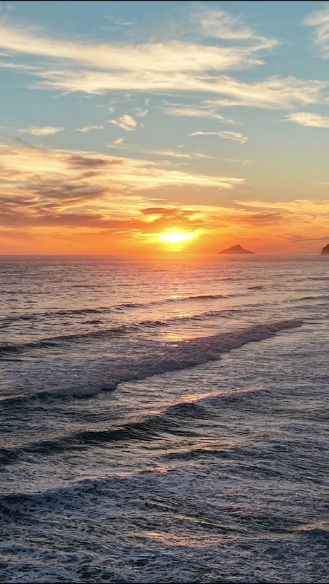Vertical Tropical Beach Sunset with Ocean Waves Stock Footage 340528679