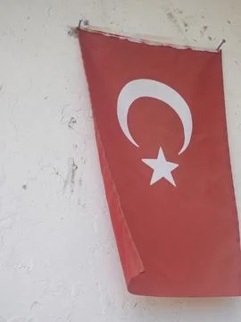 Vertical Turkish Flag Hanging on a Wall Close Up 4K Stock Photos