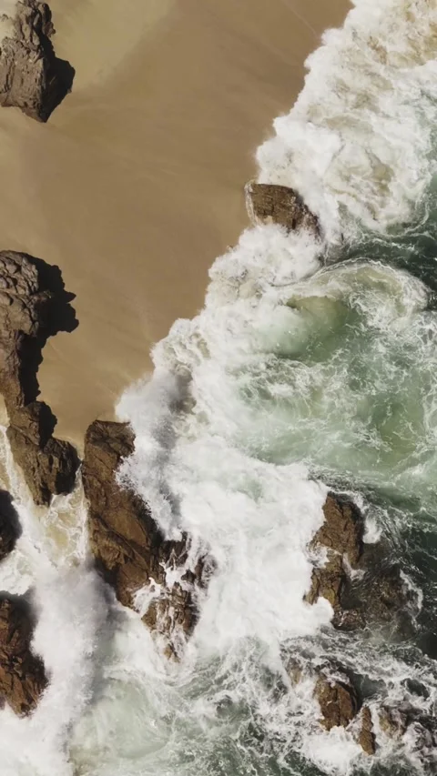 Vertical Turn Over Sea Waves and Rocks Stock Footage 285567563