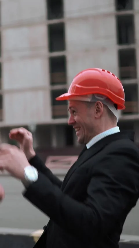 Vertical of Two architect customers funny high five Stock Footage 305455678