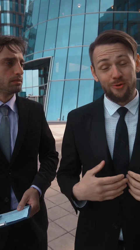 Vertical of Two business competitors try to make You offer Stock Footage 305500742