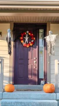 Vertical Two fresh fall pumpkins outside a house Stock Photos