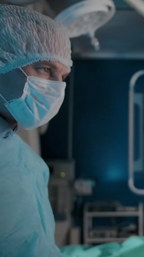 Vertical of Two serious doctors look at each other before making a decision in Stock Footage 276919595