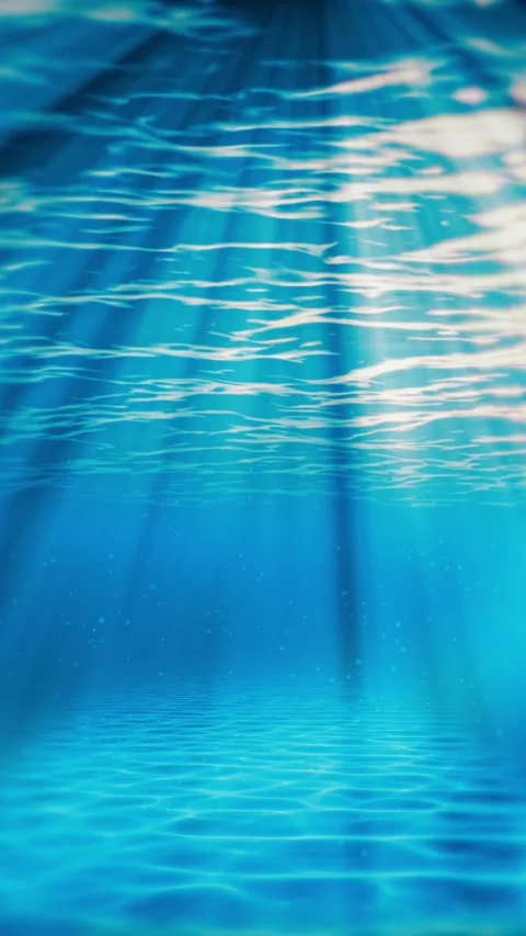 Vertical underwater seamless loop, light rays shining through water surface Stock Footage 338037057