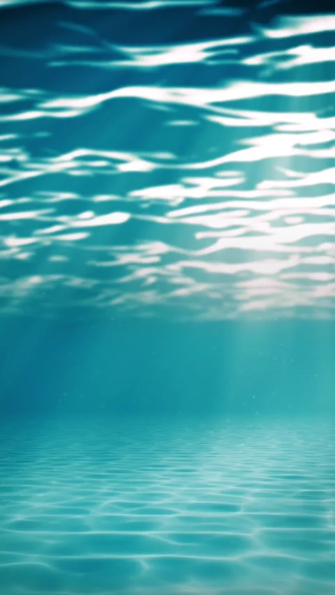 Vertical underwater seamless loop, light rays shining through water surface Stock Footage 338037109