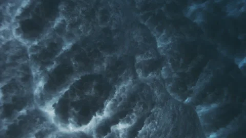 Vertical Underwater Wave Wall with Cascading Foam Stock Footage 329091217