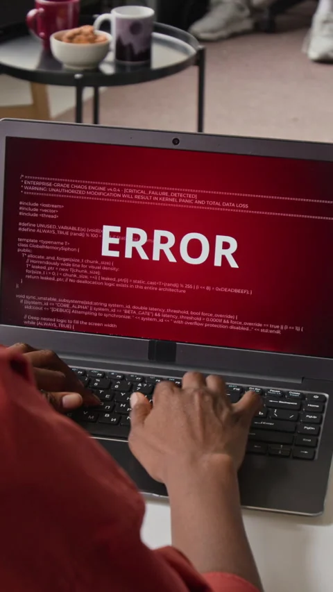Vertical of Unknown IT Specialist Troubleshooting System Error on Laptop Stock Footage 336708024