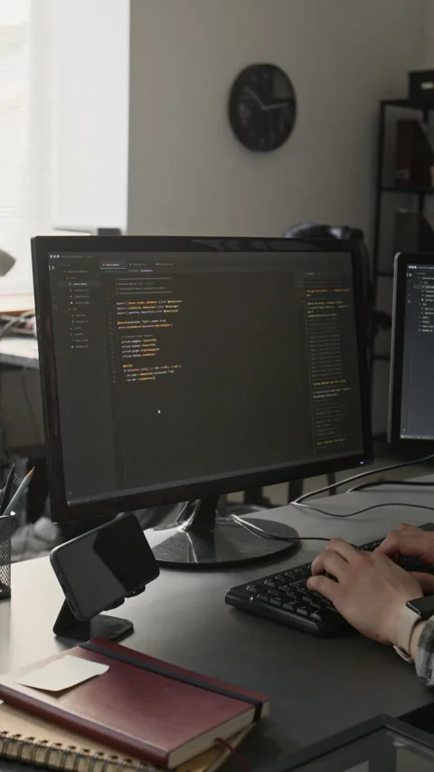 Vertical of Unknown Man Typing Software Code on Computer Keyboard in Office Stock Footage 336716685