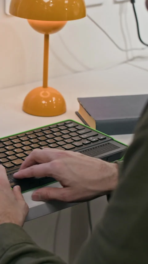 Vertical of Unrecognizable Blind Person Using Tactile Computer Keyboard Stock Footage 327454222