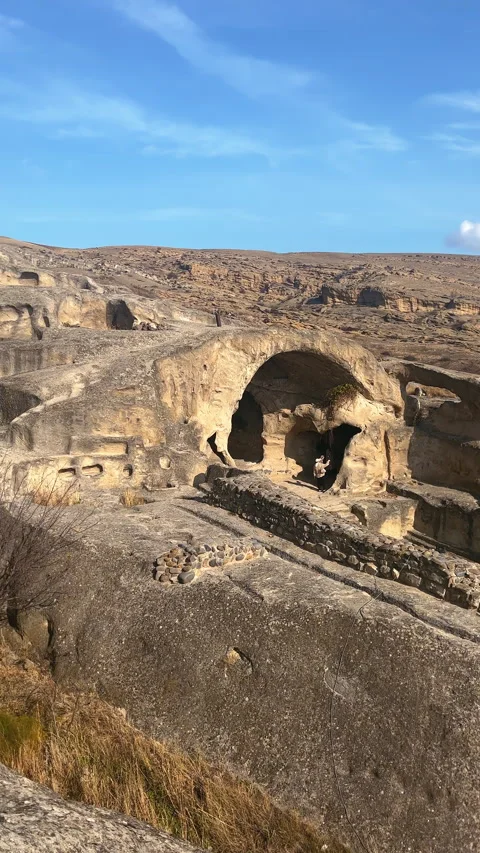 VERTICAL Uplistsikhe ancient cave town near Gori city in Georgia Stock Footage 295448446