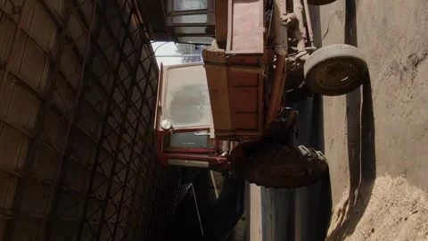 Vertical ussr old soviet tractor and agricultural equipment for harvesting Stock Footage 246959087