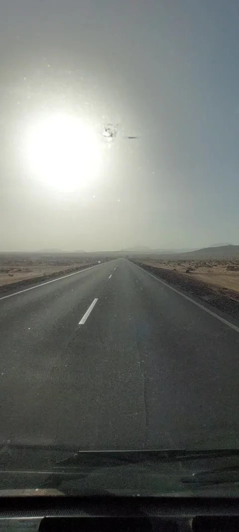 Vertical vehicle point of view of driving a straight road Stock Footage 266422866