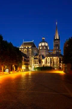 Vertical version of the cathedral of Aachen, Germany with night blue sky. Stock Photos