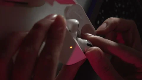 Vertical version footage of Apple Brand airpods 2 opening the charging case Stock Footage 170507244