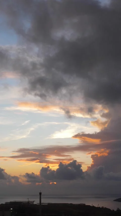 Vertical version,Time-lapse landscape , red purple blue yellow pink clouds are Stock Footage
