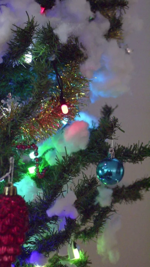 Vertical vid - Christmas tree closeup blue ball Stock Footage 296125415