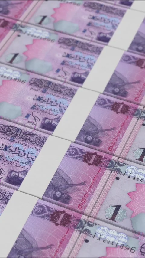 Vertical video of 1 LIBYAN DINAR banknotes printed by a money press 動画素材 303207713