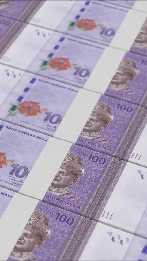 Vertical video of 100 MALAYSIAN RINGGIT banknotes printed by a money press Stock Footage 303207877