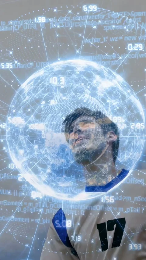 Vertical video: 17 player looking up bracing holo globe overhead showing sports Stock Footage 333862304