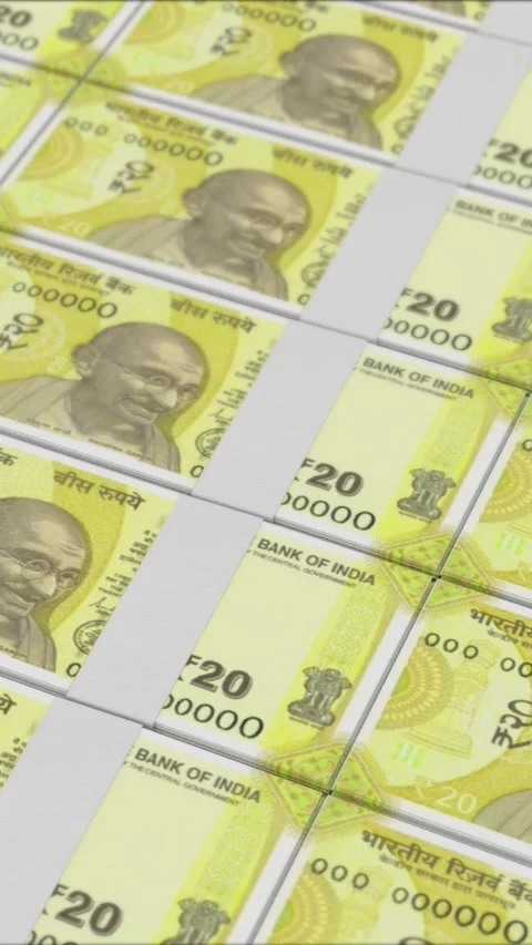 Vertical video of 20 RUPEES banknotes printing by a money press Stock Footage 303207349