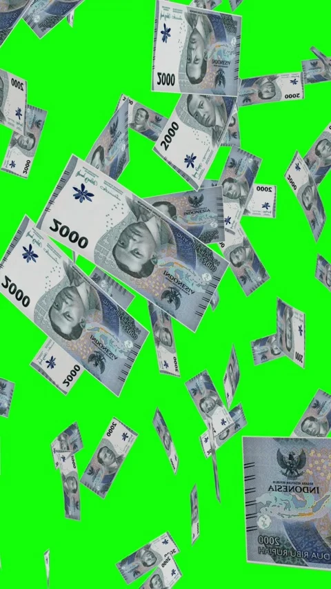 Vertical video of 2000 INDONESIAN RUPIAH notes falling Green screen Stock Footage 302813320