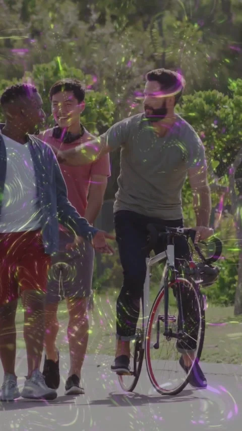 Vertical video: 3 men walking leisure path, cyclist slowing, tapping shoulder Stock Footage 331721149