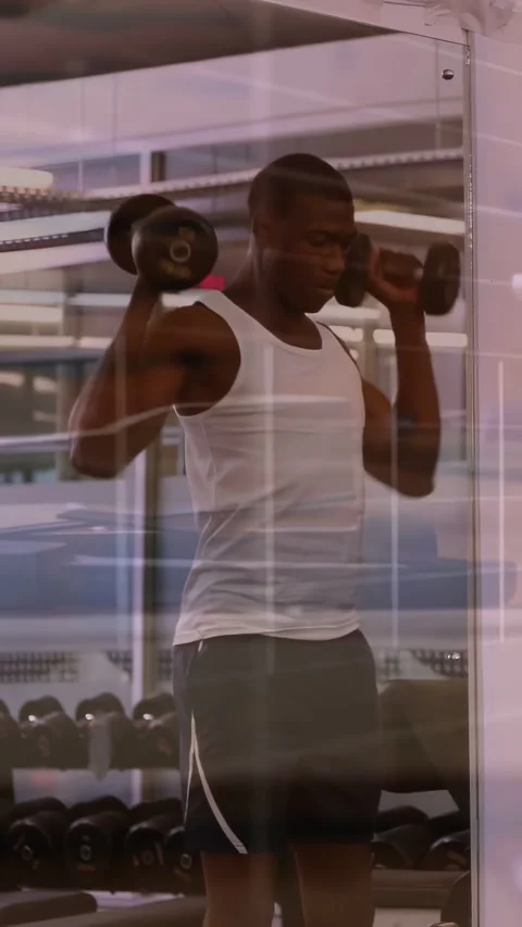 Vertical video: 3D lifter starting set pressing weights up-down to build Stock Footage 334547402