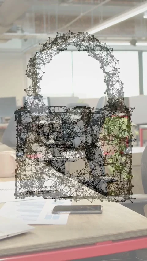 Vertical video: 3D lock wireframe building over desk after scan, then bursting Stock Footage 334704826