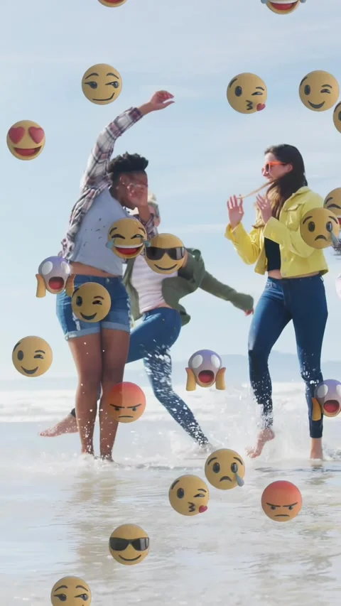 Vertical video: 4 women running in surf, energizing as emoji overlay drifting Video stock 330655385