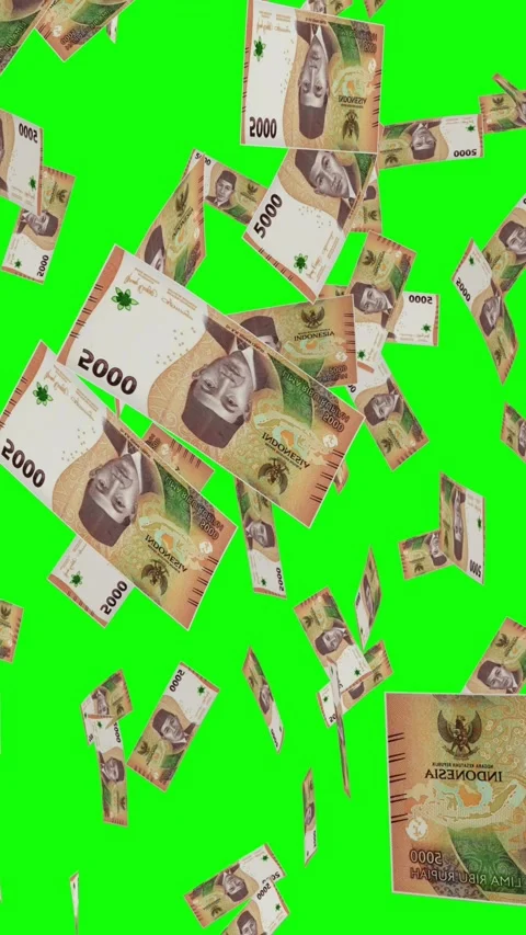 Vertical video of 5000 INDONESIAN RUPIAH notes falling Green screen Stock Footage 302813319