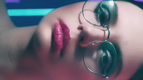 Vertical video 90s look optic fashion girl glasses Stock Footage 234480601