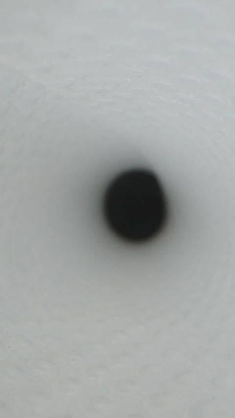 Vertical video. An abstraction, the camera inside a white tunnel with rapidly mo Stock Footage 247959422