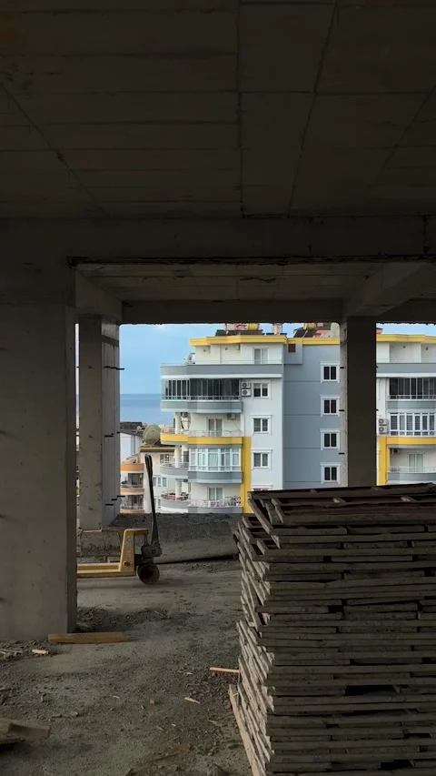Vertical Video of Active Building Site Workers Completing Wall Sections Stock Footage 342404801