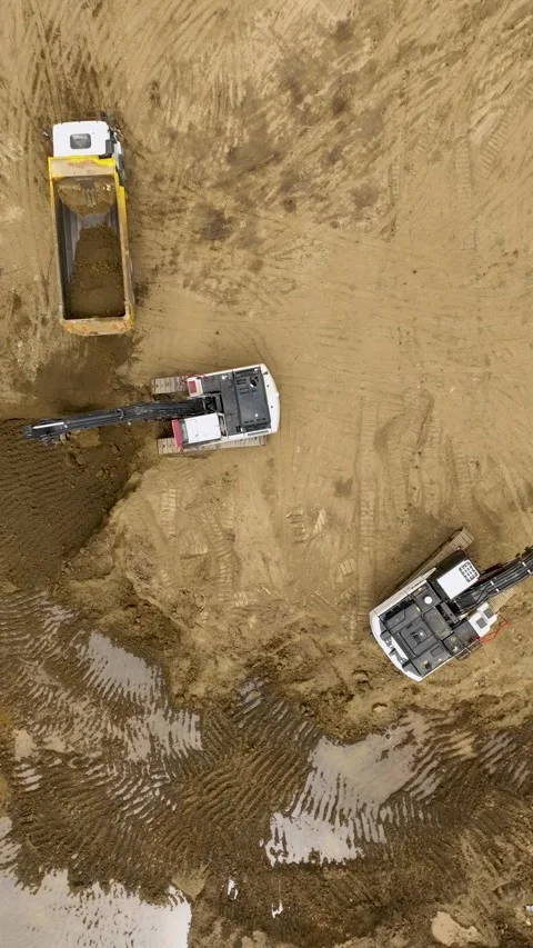 Vertical Video: Active High-Rise Development With Builders and Machinery Stock-Footage 344310367