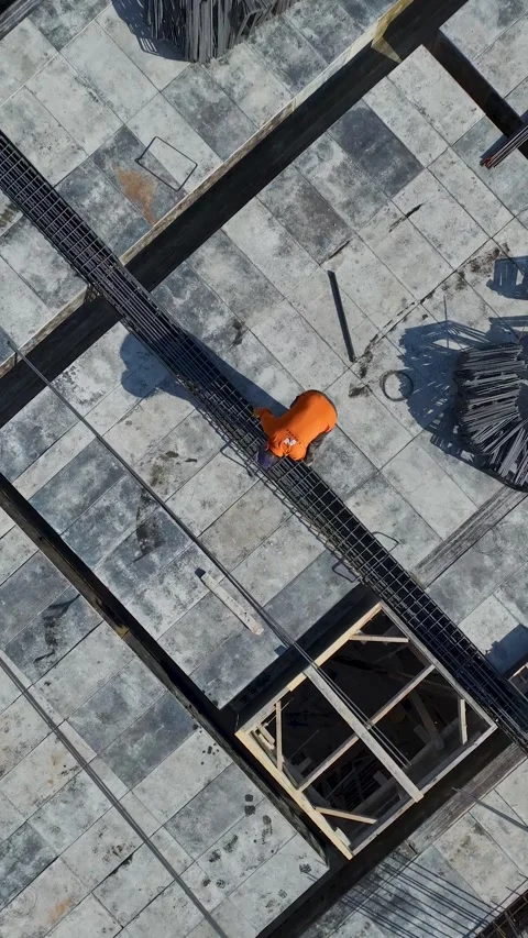 Vertical Video of Active Wall Construction and Metal Support Installation Stock Footage 342349316